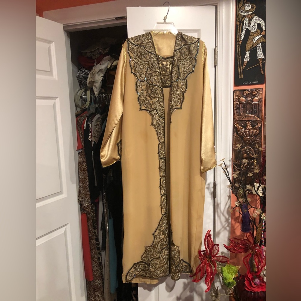 Mediterranean inspired two piece long sleeve gold dress with sleeveless jacket
